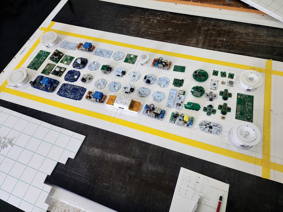 One of our designers creating the complex template design for the multiple electron circuit boards and components in this 52 piece collection.