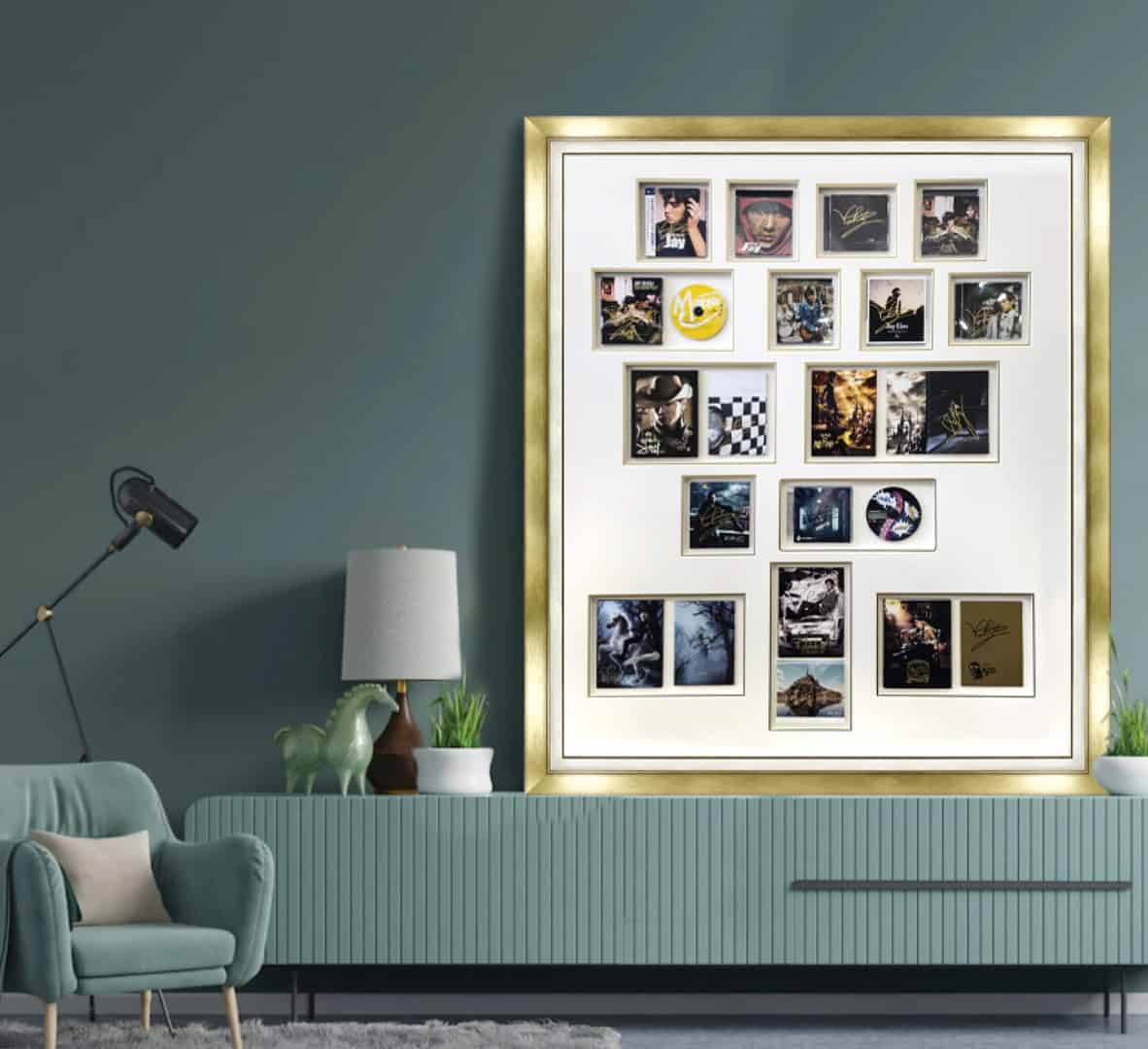 A complex arrangement of a collection of multiple autographed Jay Zhou CDs and DVD's framed/