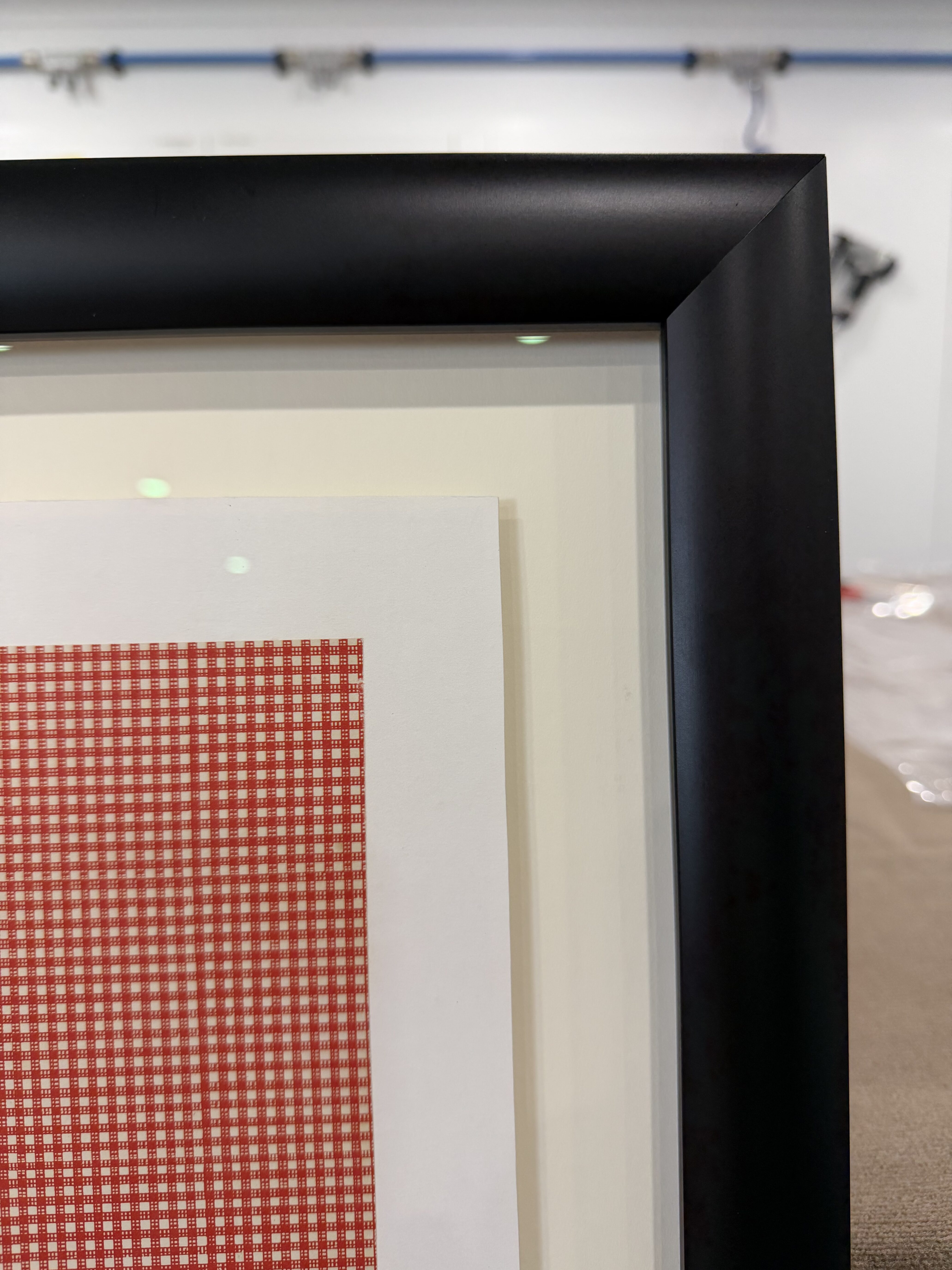 retro curve black frame to offset the mid century tone of this vintage snoopy poster, framed by dawsons framing
